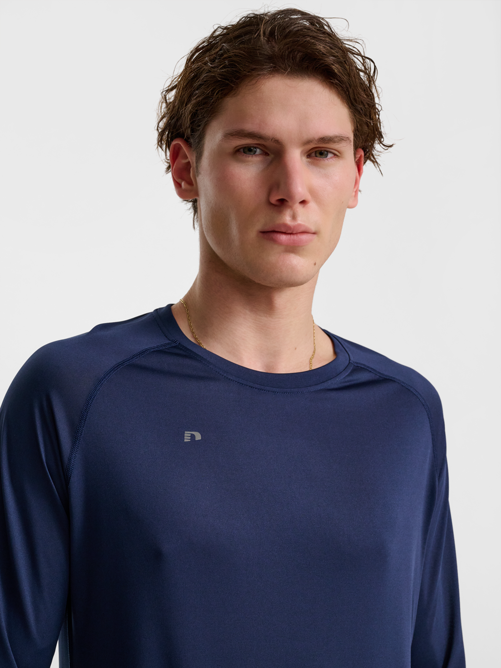 Men's long-sleeve running shirt in Black Iris, detail on model