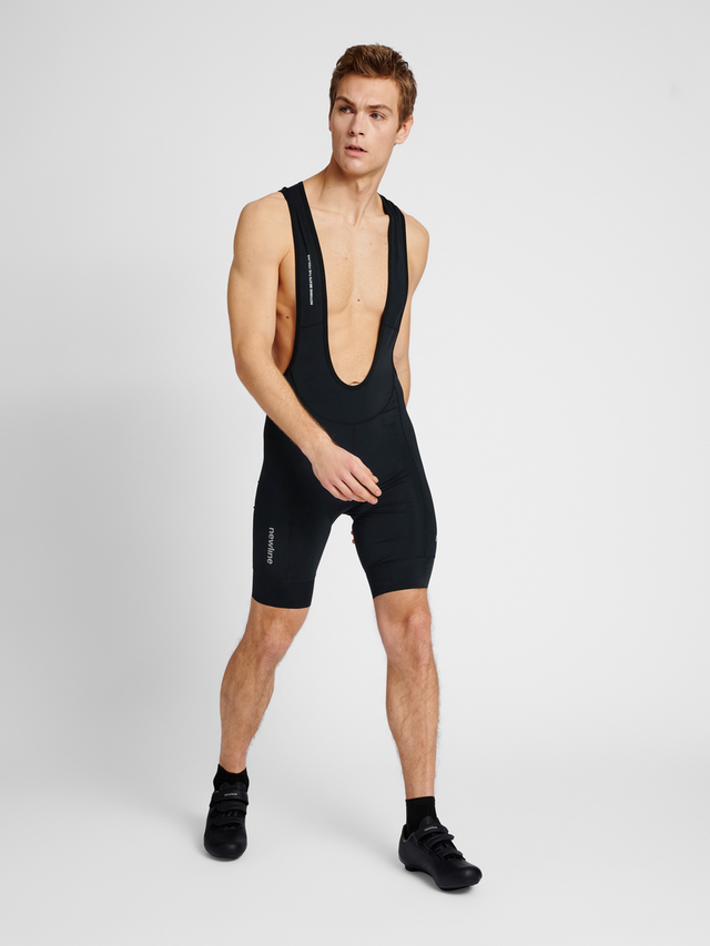 Men's cycling bib shorts in black, back view with mesh panel